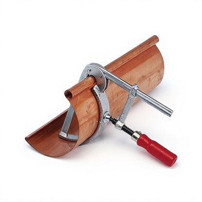 Roofify MASC gutter clamping tool securing a copper gutter section for professional soldering and riveting work.